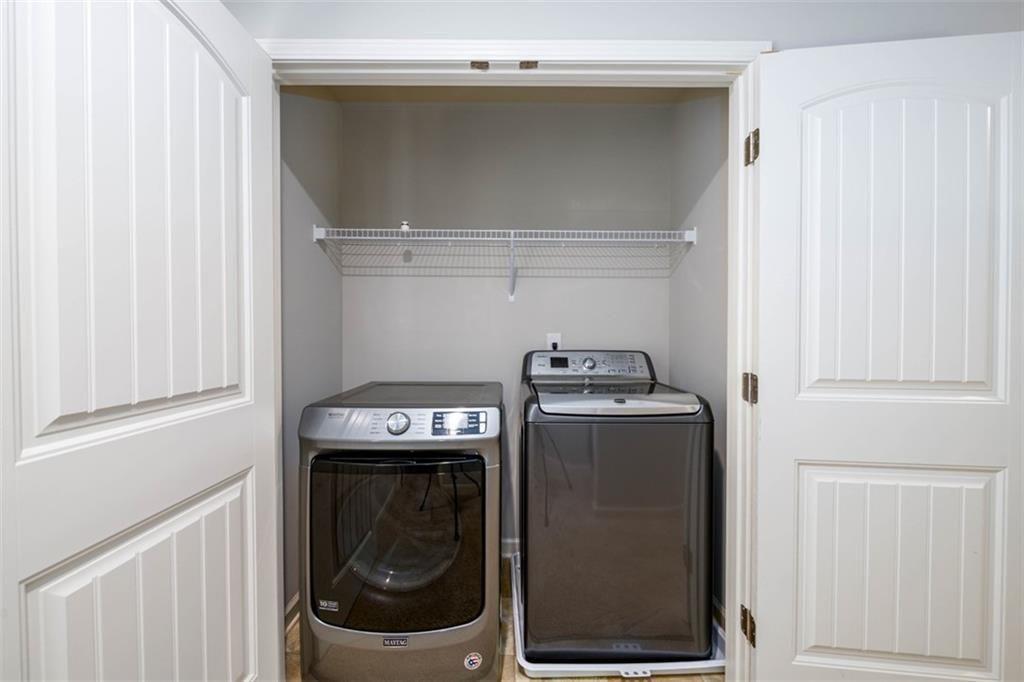 6622 Trailblazer Road Flowery Branch, GA 30542 - Photo 16 of 51 a utility room with dryer and washer