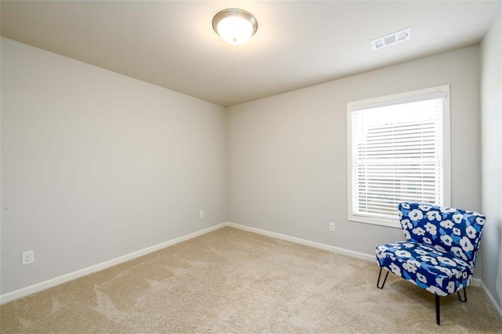 6622 Trailblazer Road Flowery Branch, GA 30542 - Photo 29 of 51 an empty room with windows