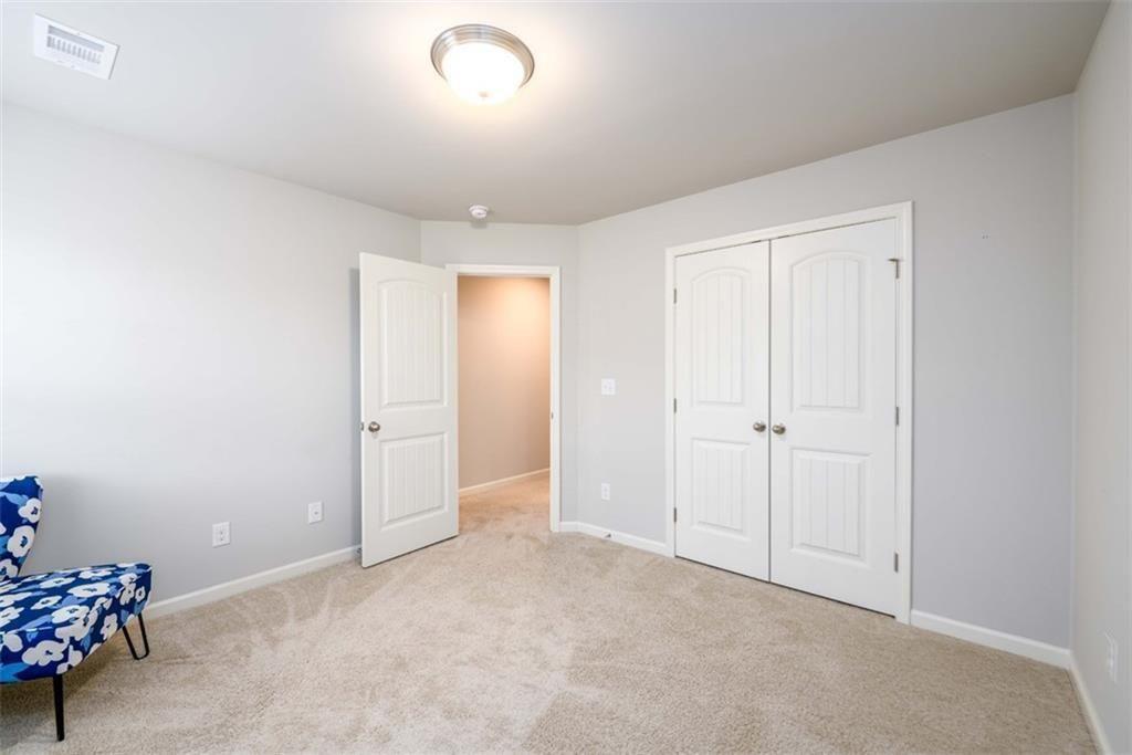 6622 Trailblazer Road Flowery Branch, GA 30542 - Photo 30 of 51 a view of an empty room