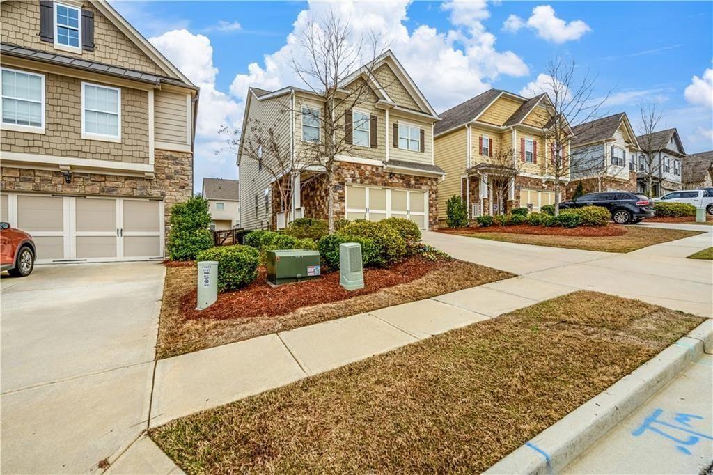 6622 Trailblazer Road Flowery Branch, GA 30542 - Photo 3 of 51 a view of a street with houses