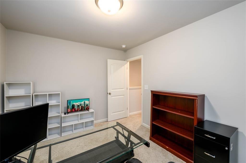 6622 Trailblazer Road Flowery Branch, GA 30542 - Photo 32 of 51 a room with storage and utility