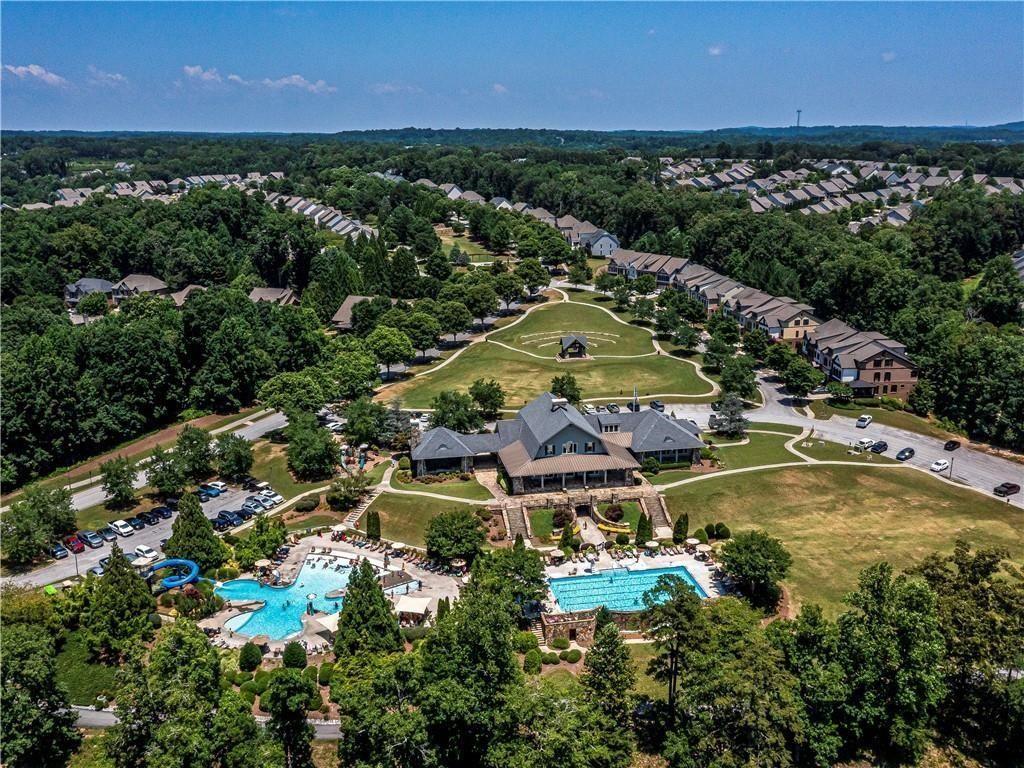 6622 Trailblazer Road Flowery Branch, GA 30542 - Photo 43 of 51 an aerial view of residential houses with outdoor space and swimming pool