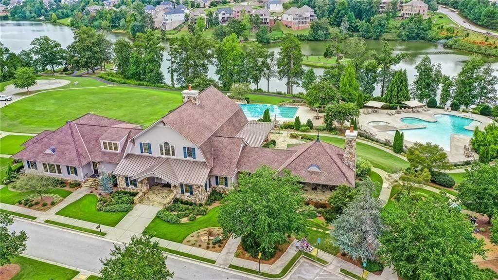 6622 Trailblazer Road Flowery Branch, GA 30542 - Photo 47 of 51 an aerial view of multiple houses with yard