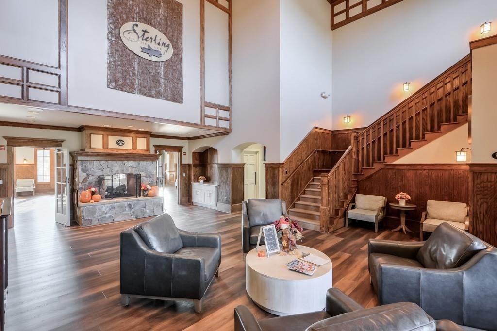 6622 Trailblazer Road Flowery Branch, GA 30542 - Photo 48 of 51 a dining room with furniture and wooden floor