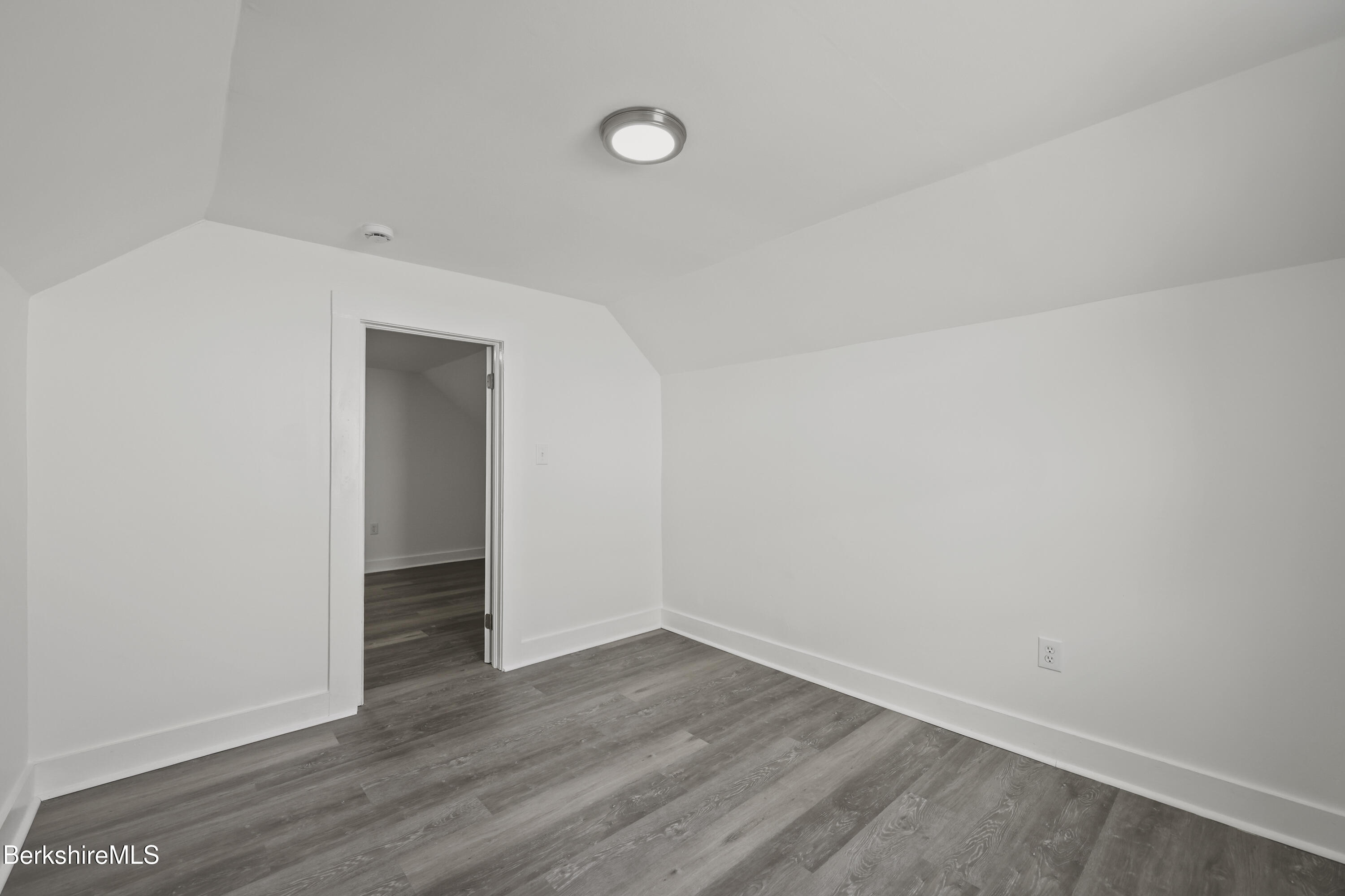 1990 East Street Pittsfield, MA 01201 - Photo 22 of 33 a view of an empty room with wooden floor