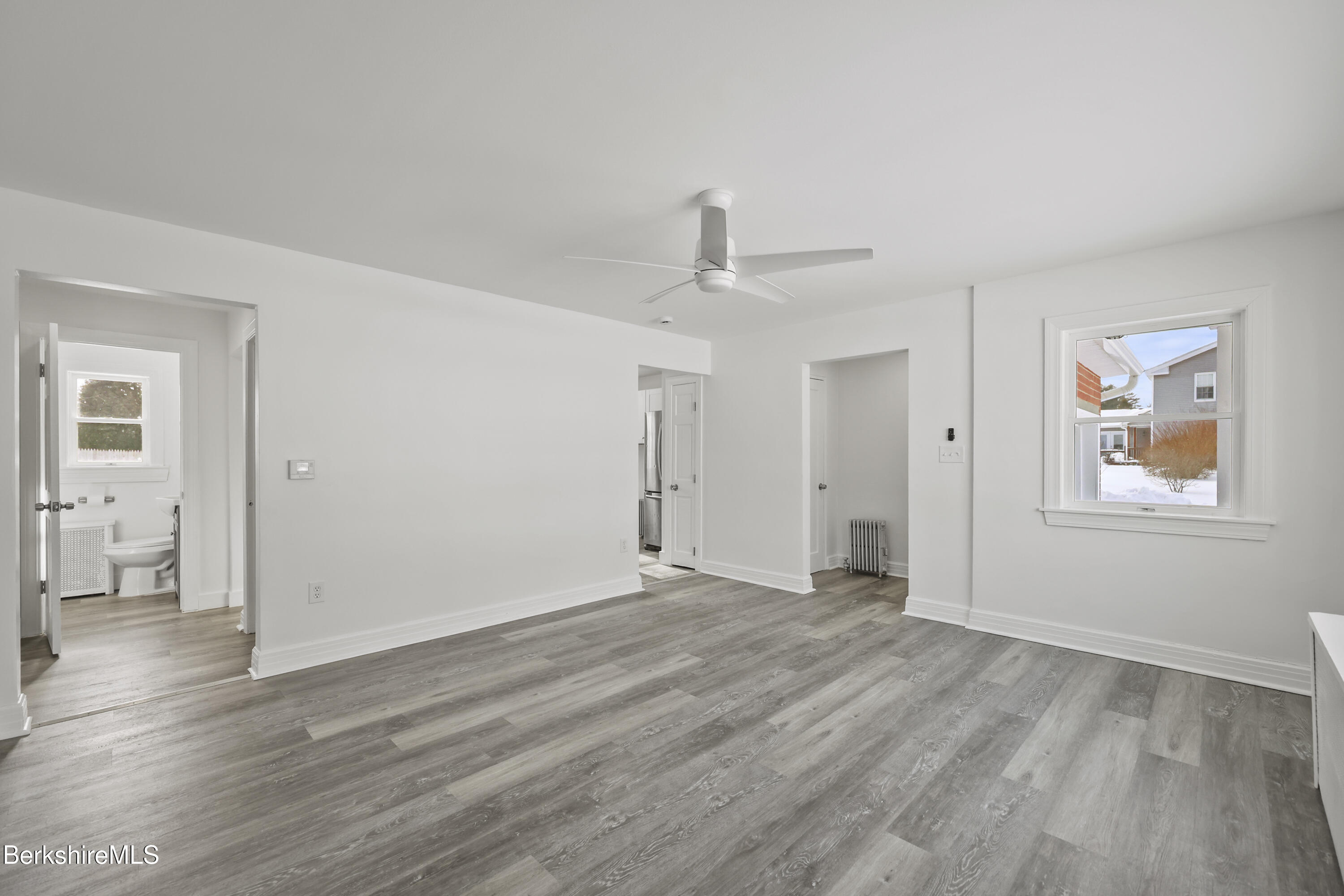 1990 East Street Pittsfield, MA 01201 - Photo 6 of 33 a view of an empty room with wooden floor