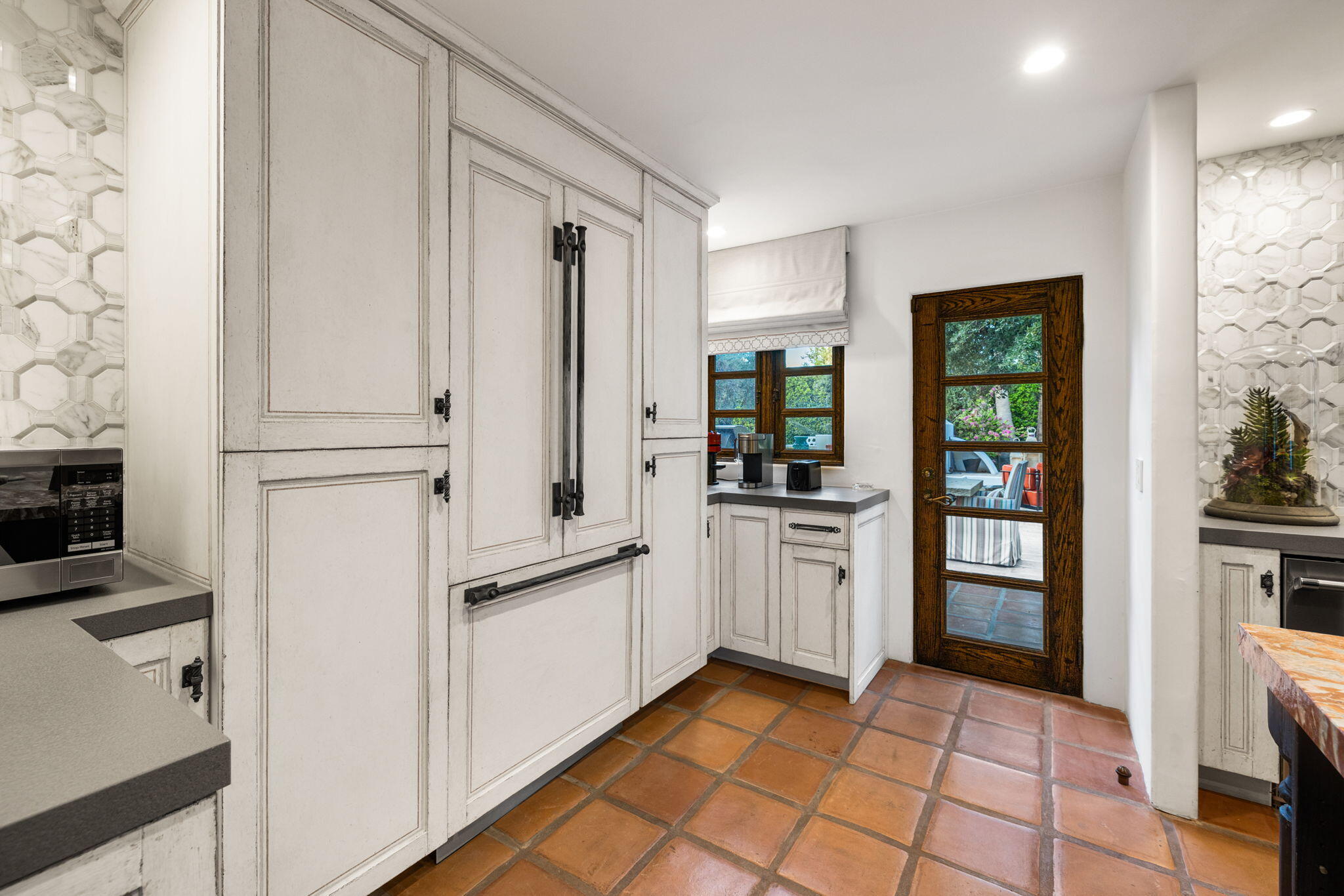 535 North Belardo Road Palm Springs, CA 92262 - Photo 13 of 45 a kitchen with white cabinets and refrigerator