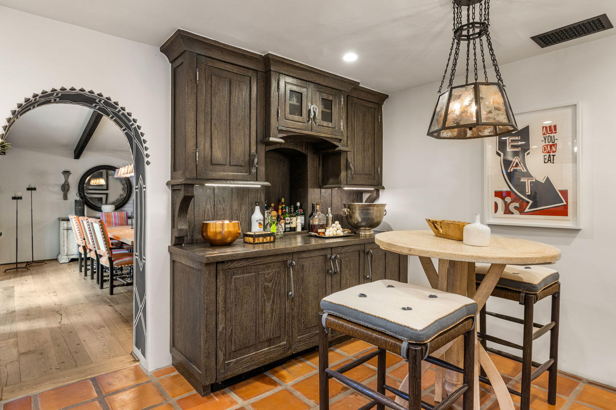 535 North Belardo Road Palm Springs, CA 92262 - Photo 15 of 45 a kitchen with stainless steel appliances granite countertop a stove a refrigerator a sink dishwasher a dining table and chairs with wooden floor