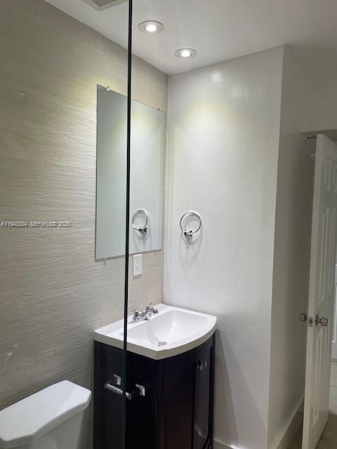 219 Southwest 9th Avenue, Unit 2 Miami, FL 33130 - Photo 13 of 28 a bathroom with a sink a toilet a mirror and shower