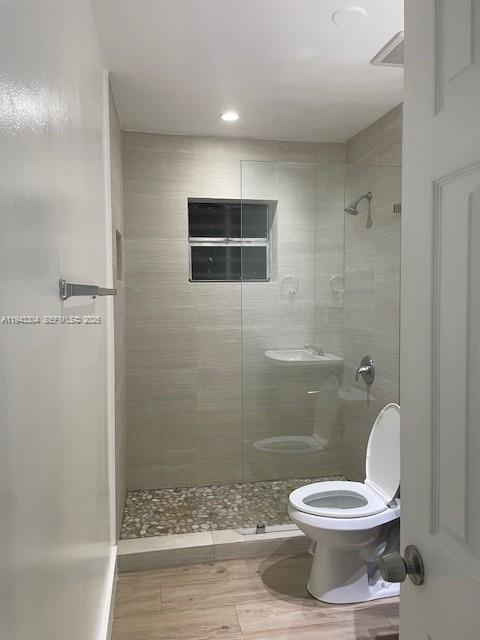 219 Southwest 9th Avenue, Unit 2 Miami, FL 33130 - Photo 15 of 28 a bathroom with a toilet and a shower