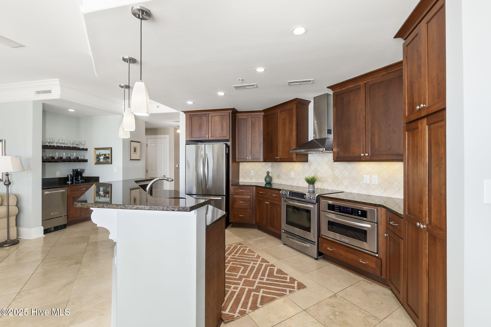1435 Salter Path Road, Unit G4 GRANDE VILLAS Indian Beach, NC 28512 - Photo 5 of 41 Kitchen w/ island & bar seating