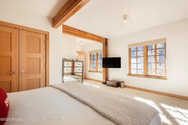 a bathroom with a double vanity sink mirror and double