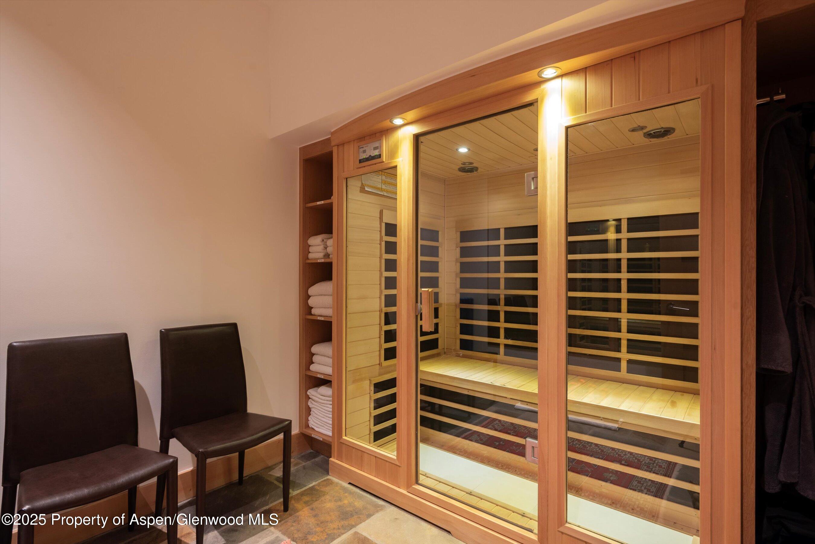 6770 Castle Creek Road Aspen, CO 81612 - Photo 36 of 53 a view of workspace with wooden floor and windows