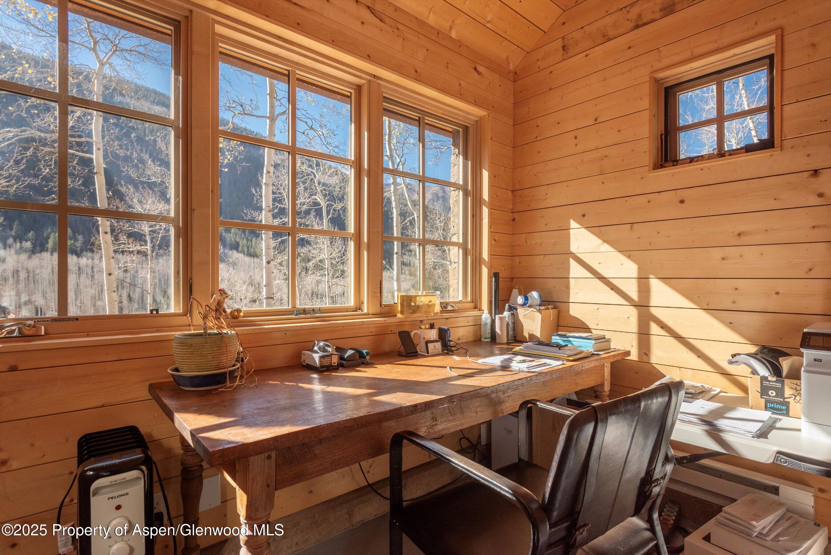 6770 Castle Creek Road Aspen, CO 81612 - Photo 45 of 53 a dining room with furniture and window