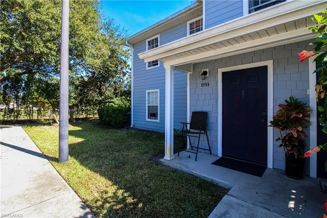 front view of a house with a yard