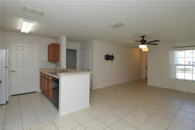 a kitchen with a stove and a sink