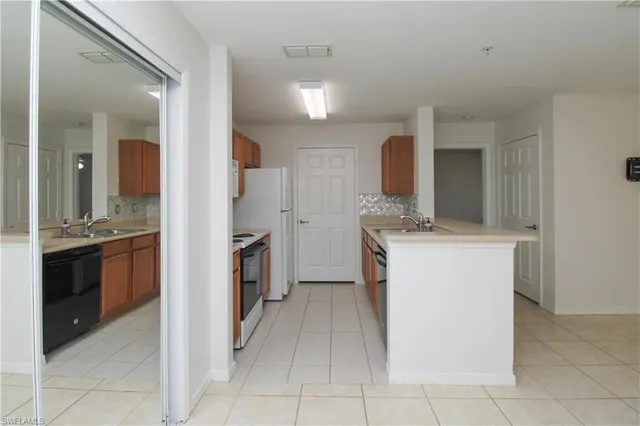 a room with a washer and dryer