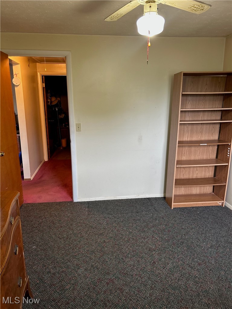 8753 West Ridge Road, Unit A Elyria, OH 44035 - Photo 17 of 21 Bedroom 2 with carpet floors, and ceiling fan