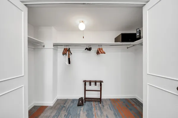 a bathroom with a bathtub and a toilet