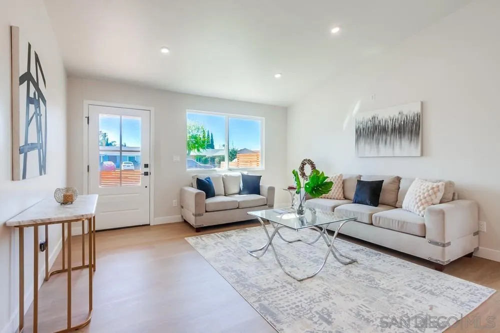 122 Lancer Avenue Oceanside, CA 92058 - Photo 16 of 67 a living room with furniture and a potted plant