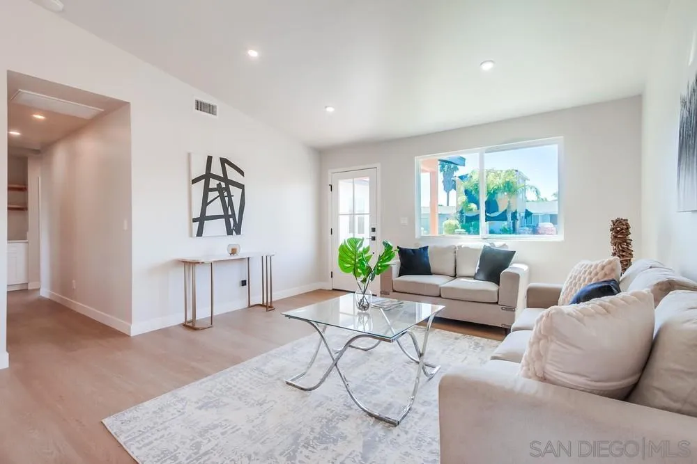 122 Lancer Avenue Oceanside, CA 92058 - Photo 17 of 67 a living room with furniture and a large window