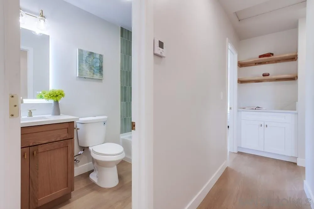 122 Lancer Avenue Oceanside, CA 92058 - Photo 18 of 67 a bathroom with a sink a toilet and vanity