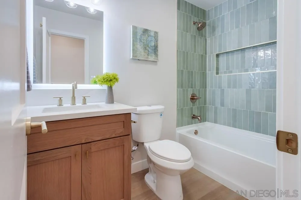 122 Lancer Avenue Oceanside, CA 92058 - Photo 19 of 67 a bathroom with a sink toilet and shower