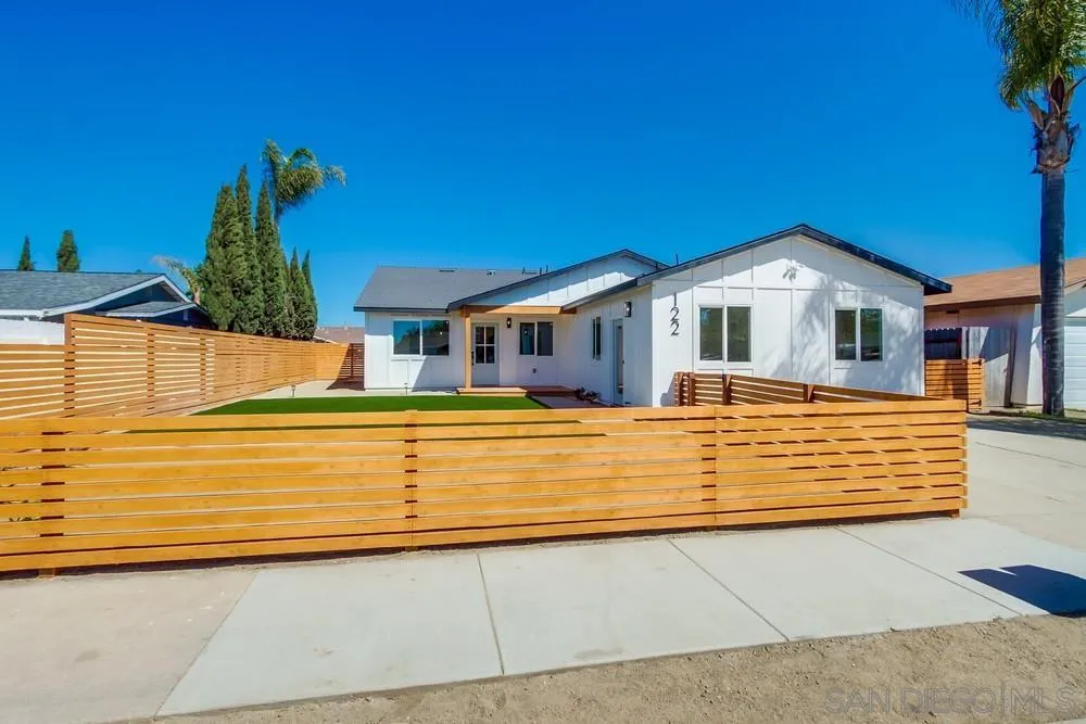 122 Lancer Avenue Oceanside, CA 92058 - Photo 2 of 67 a front view of a house with a large windows