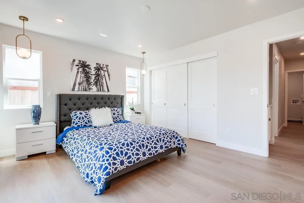 122 Lancer Avenue Oceanside, CA 92058 - Photo 22 of 67 a bedroom with a bed and a window