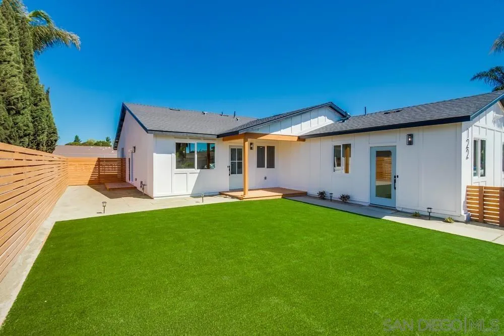 122 Lancer Avenue Oceanside, CA 92058 - Photo 4 of 67 a view of a house with a backyard