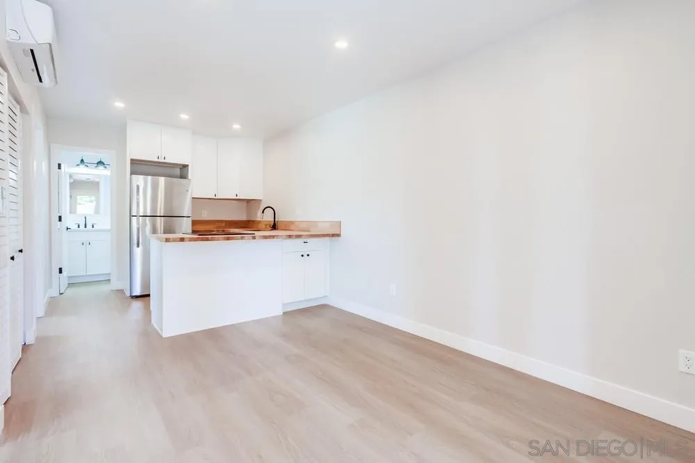 122 Lancer Avenue Oceanside, CA 92058 - Photo 50 of 67 a view of kitchen with stainless steel appliances cabinets and wooden floor