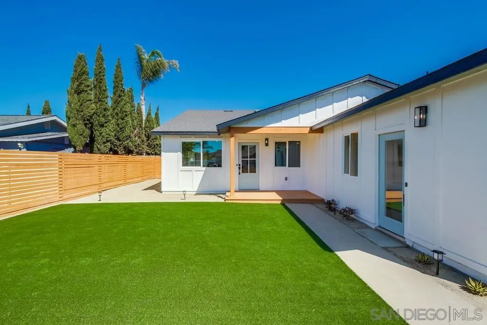 122 Lancer Avenue Oceanside, CA 92058 - Photo 5 of 67 a front view of a house with garden