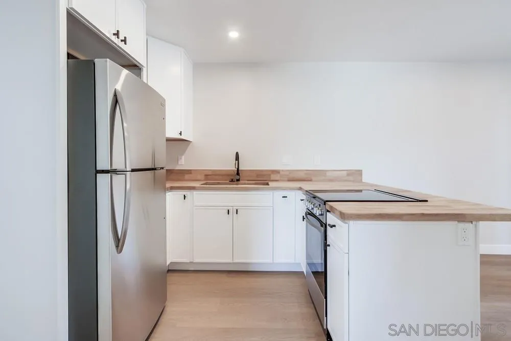 122 Lancer Avenue Oceanside, CA 92058 - Photo 52 of 67 a utility room with washer and dryer