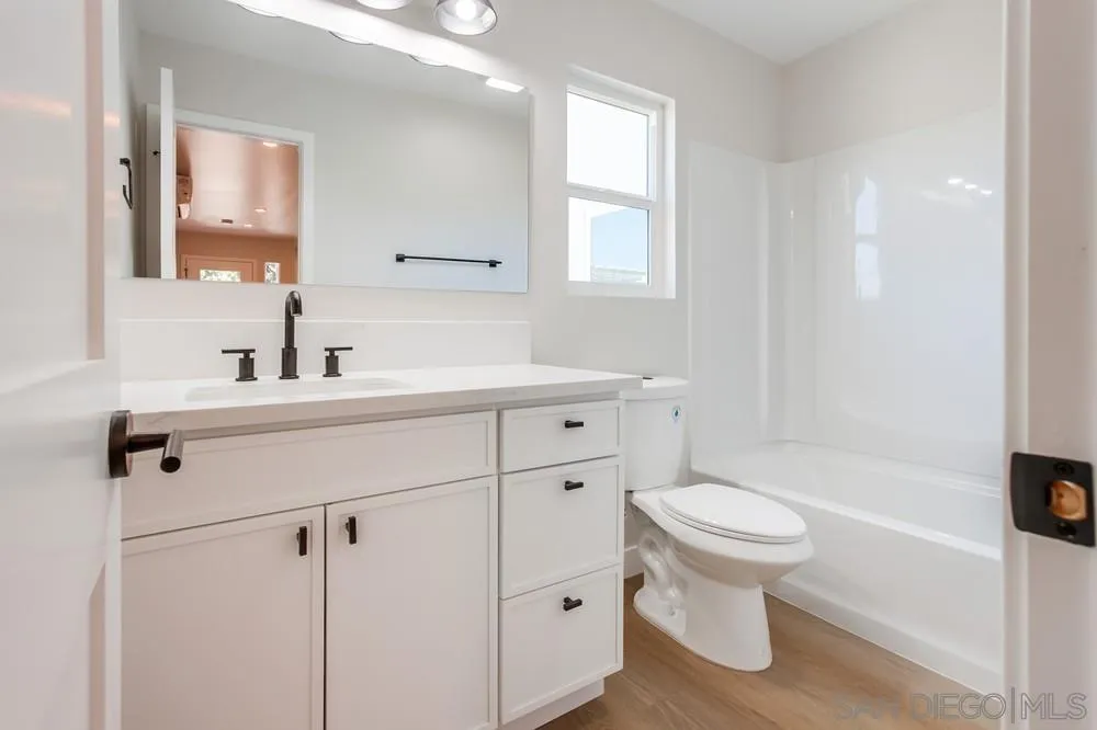 122 Lancer Avenue Oceanside, CA 92058 - Photo 59 of 67 a bathroom with a sink toilet and shower