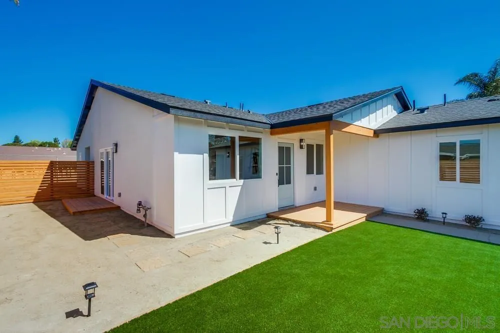 122 Lancer Avenue Oceanside, CA 92058 - Photo 6 of 67 a backyard of a house with table and chairs