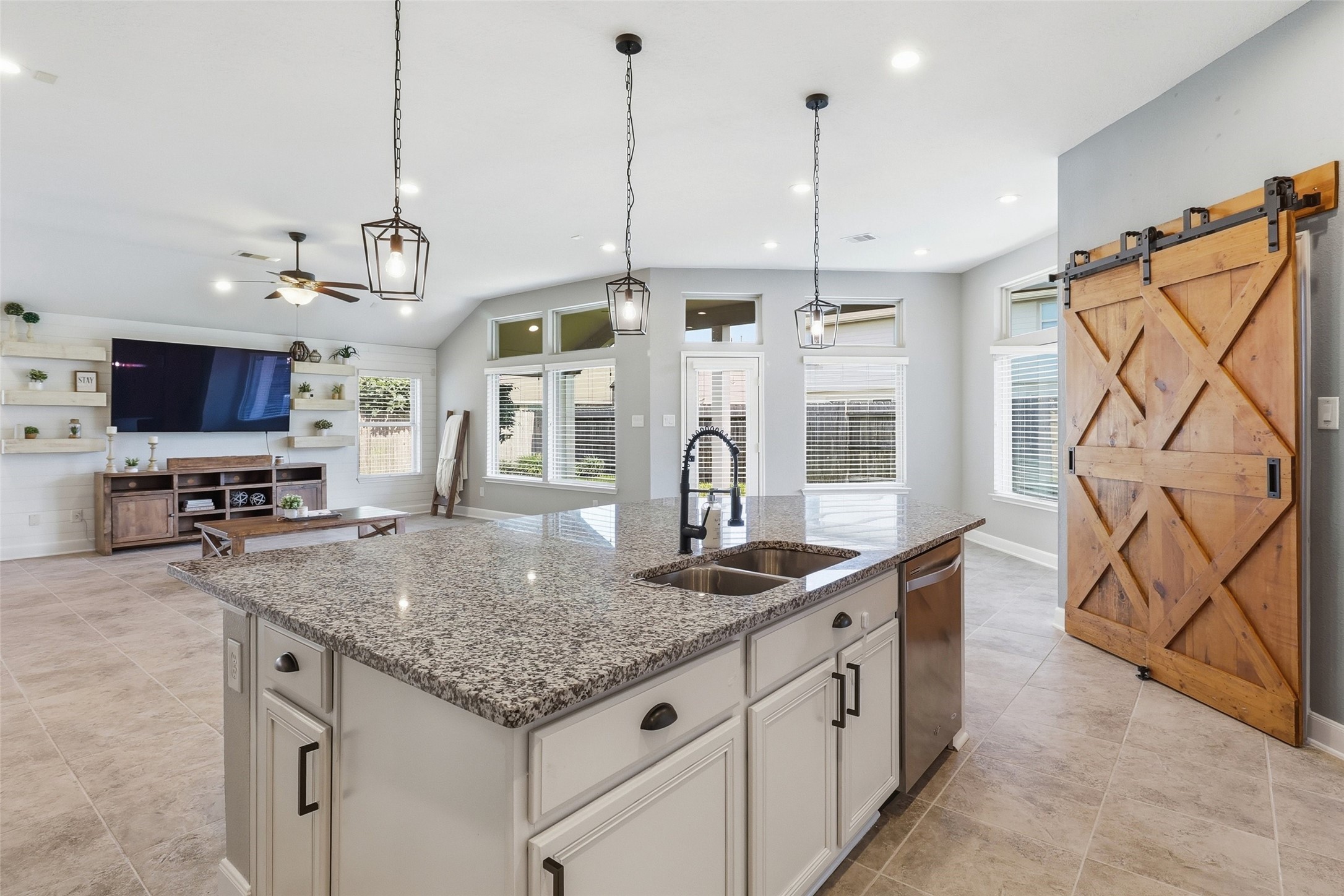 24126 Cane Fields Road Katy, TX 77493 - Photo 3 of 36 Open-concept living creates a seamless flow throughout the home.