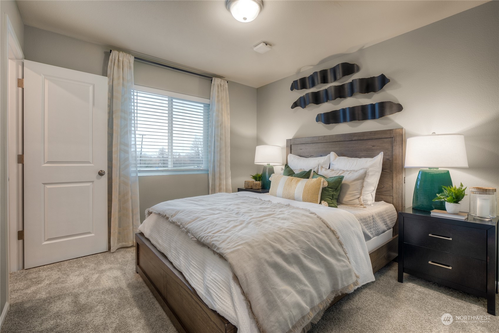 1055 17th Avenue, Unit 177 Sultan, WA 98294 - Photo 12 of 18 a bedroom with a bed and a window