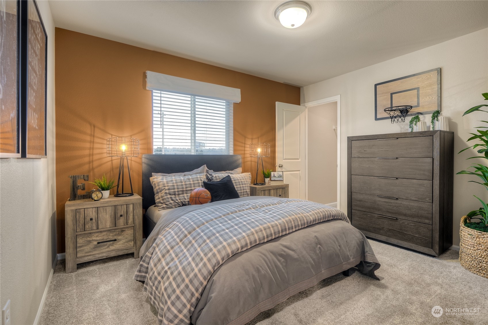 1055 17th Avenue, Unit 177 Sultan, WA 98294 - Photo 13 of 18 a bedroom with a bed and a cabinets