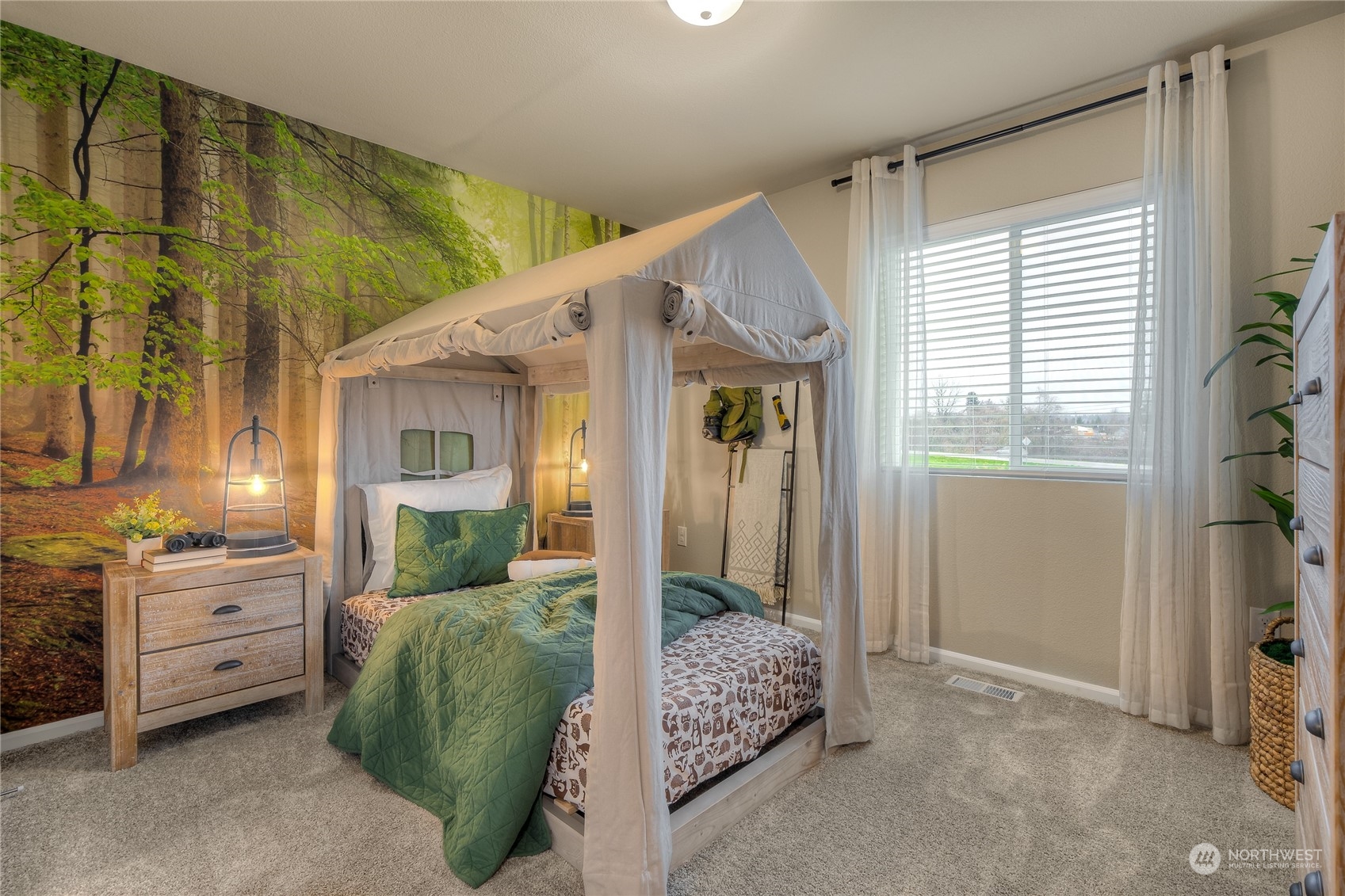 1055 17th Avenue, Unit 177 Sultan, WA 98294 - Photo 14 of 18 a bedroom with bed and window