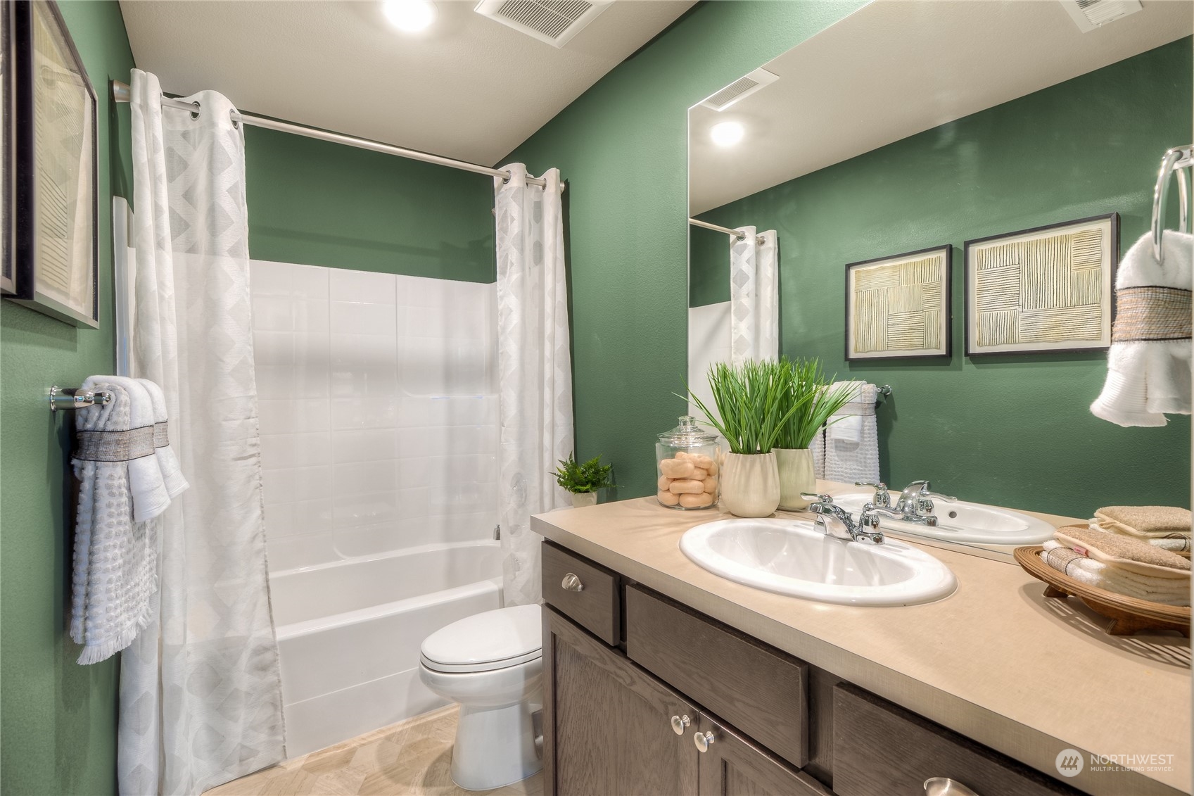 1055 17th Avenue, Unit 177 Sultan, WA 98294 - Photo 15 of 18 a bathroom with a sink toilet and shower