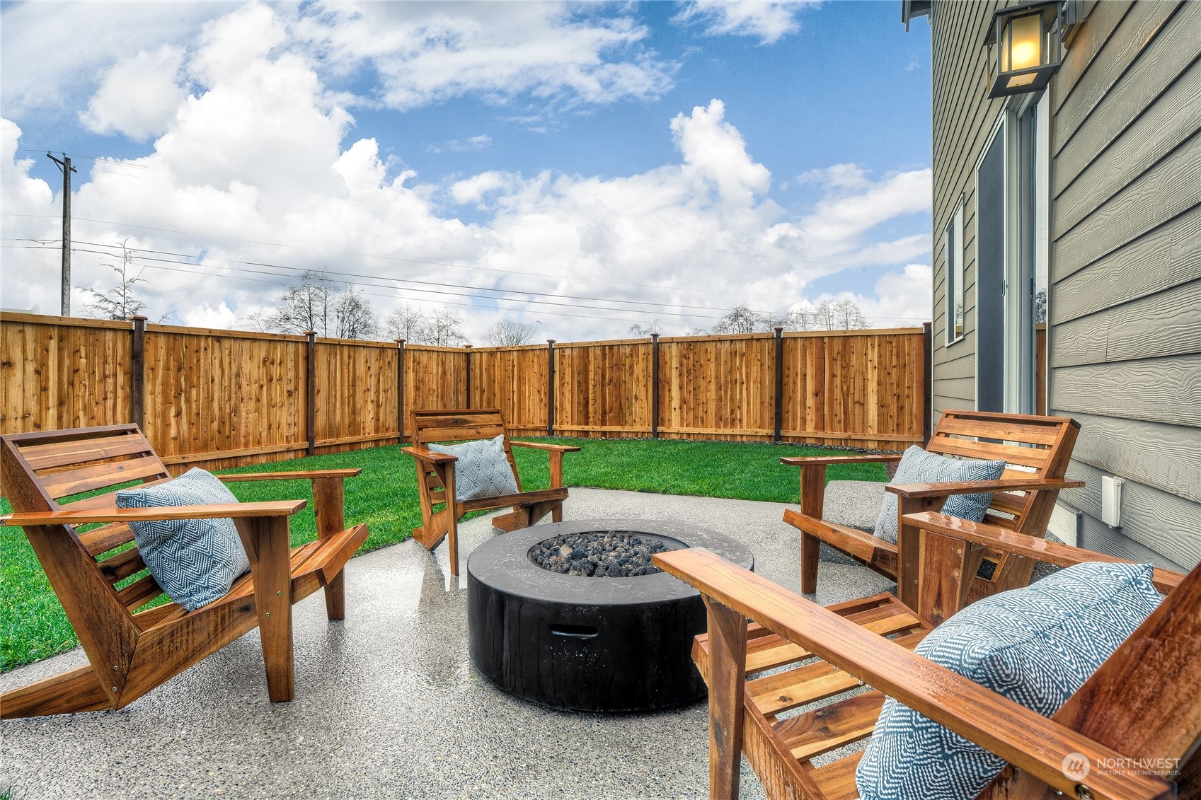 1055 17th Avenue, Unit 177 Sultan, WA 98294 - Photo 16 of 18 an outdoor sitting area with furniture and garden
