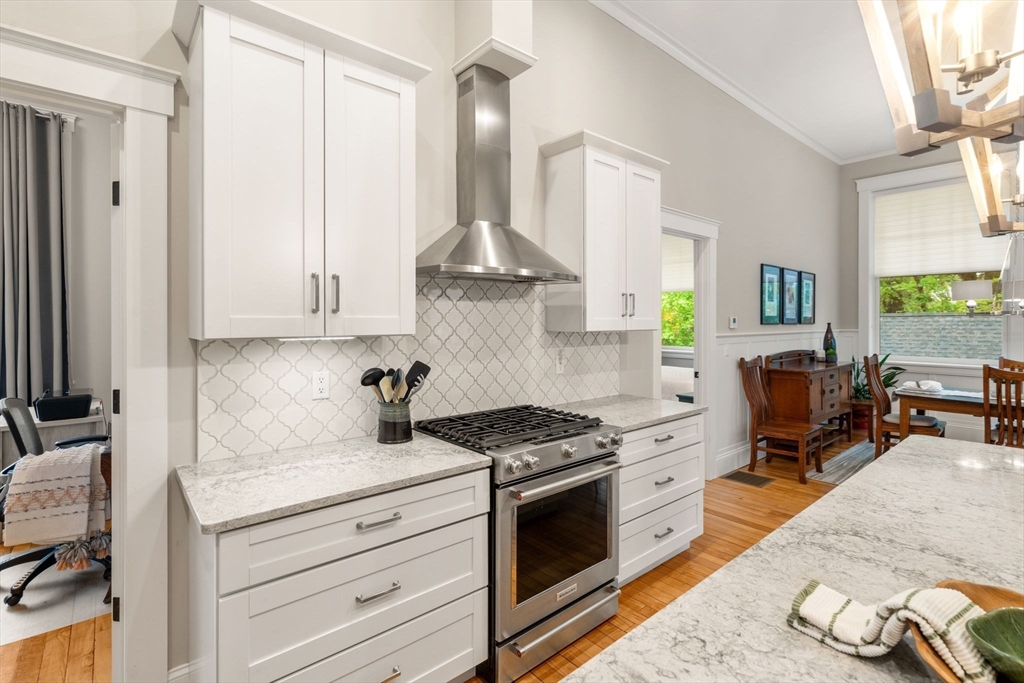 73 Pepperell Road, Unit C Groton, MA 01450 - Photo 8 of 35 a kitchen with stainless steel appliances granite countertop a stove a sink and a refrigerator