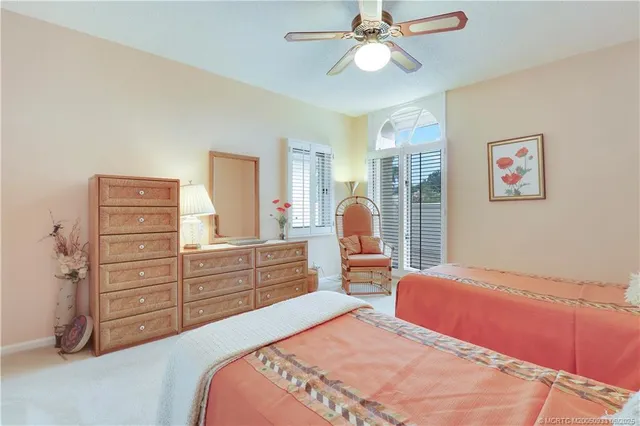 a bedroom with a bed and furniture