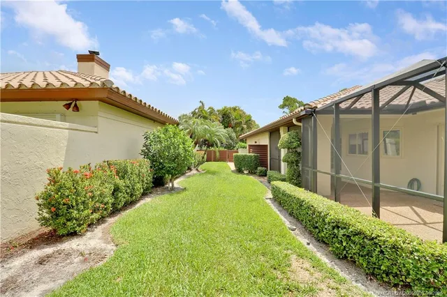 a view of a back yard of the house