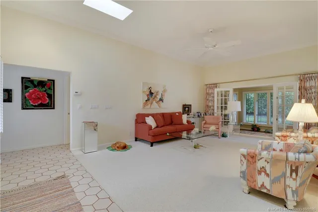 a living room with furniture and a couch