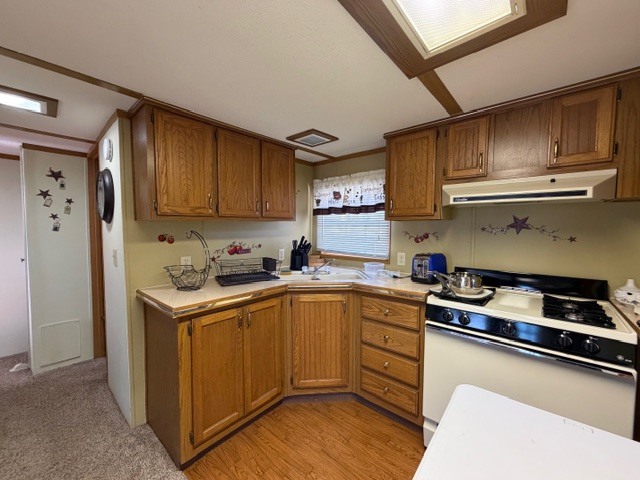 2795 East 28th Road Marseilles, IL 61341 - Photo 12 of 74 a kitchen with stainless steel appliances granite countertop a sink stove and cabinets