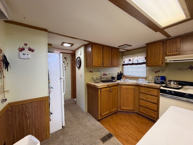 2795 East 28th Road Marseilles, IL 61341 - Photo 13 of 74 a kitchen with stainless steel appliances granite countertop a refrigerator sink and stove