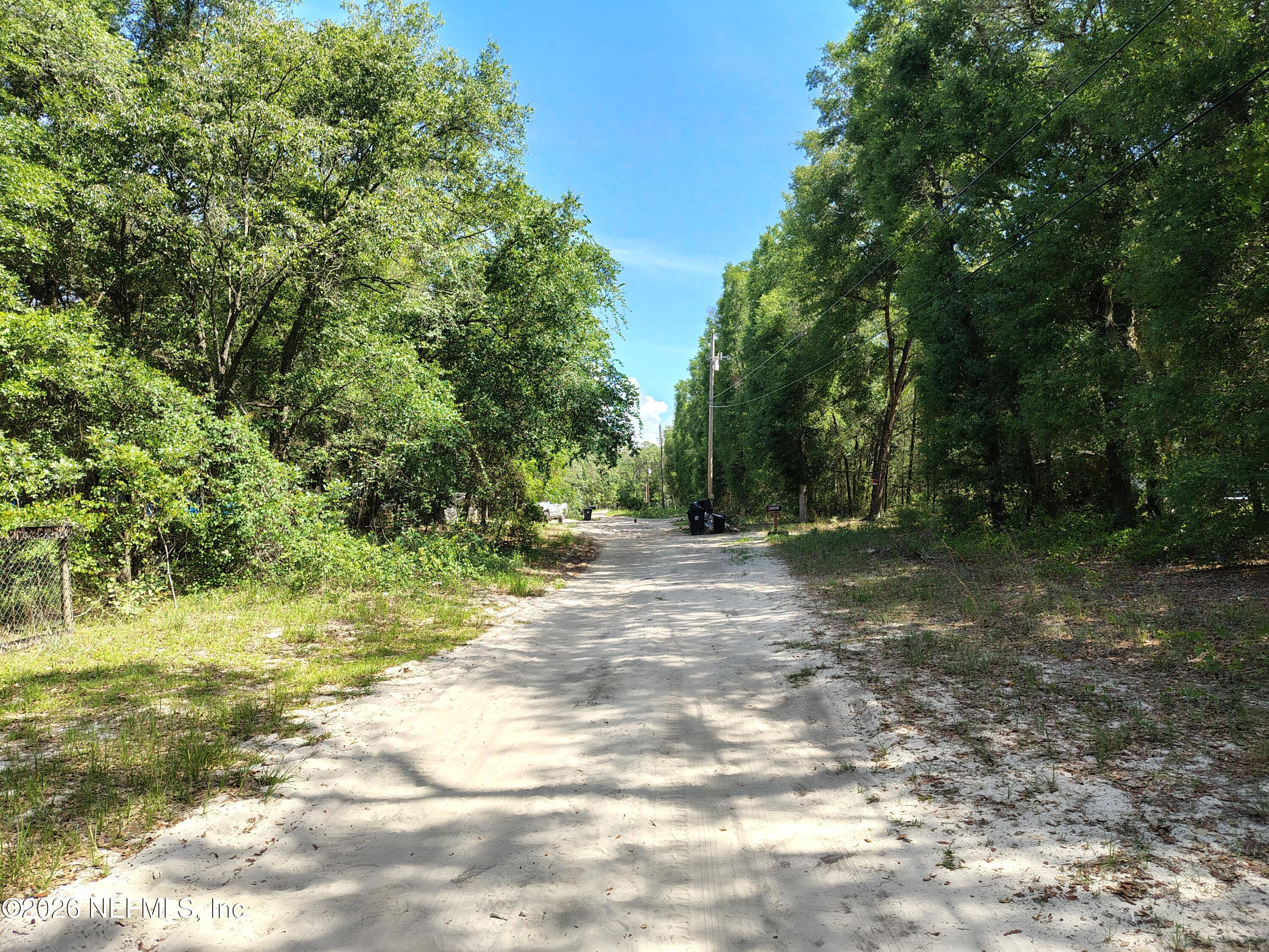 7202 Notre Dame Street Keystone Heights, FL 32656 - Photo 2 of 16 a view of outdoor space with trees all around