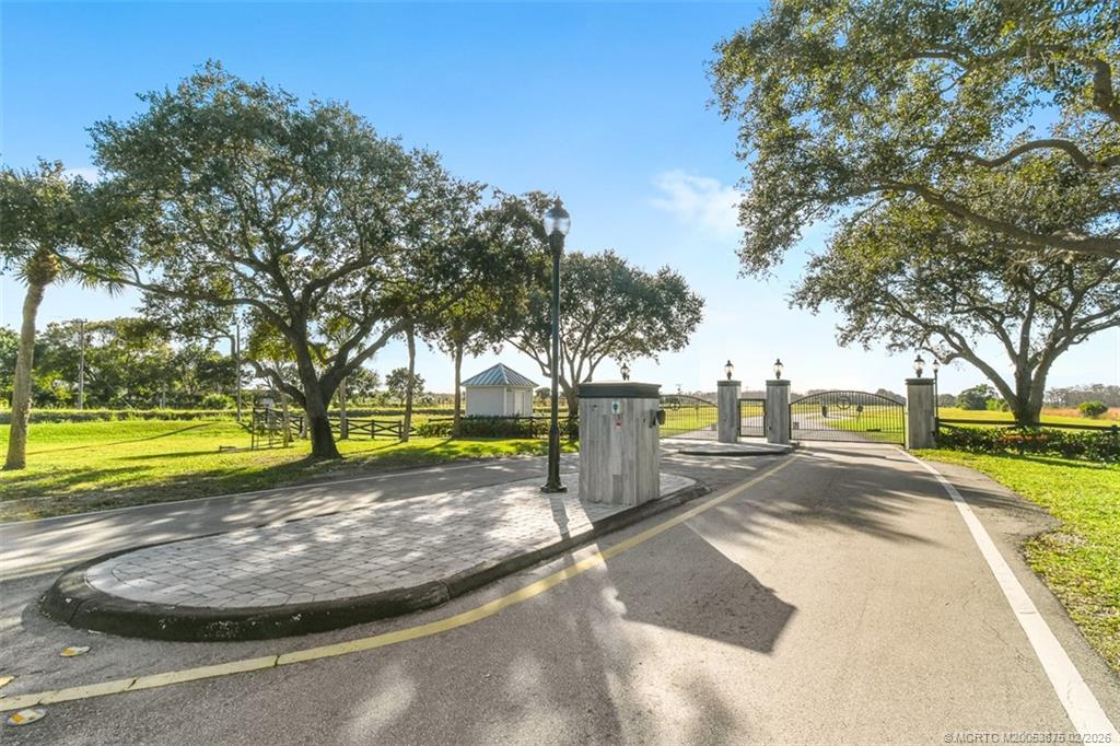 2541 Southwest Trailside Path Stuart, FL 34997 - Photo 100 of 100 a view of swimming pool with outdoor seating and yard