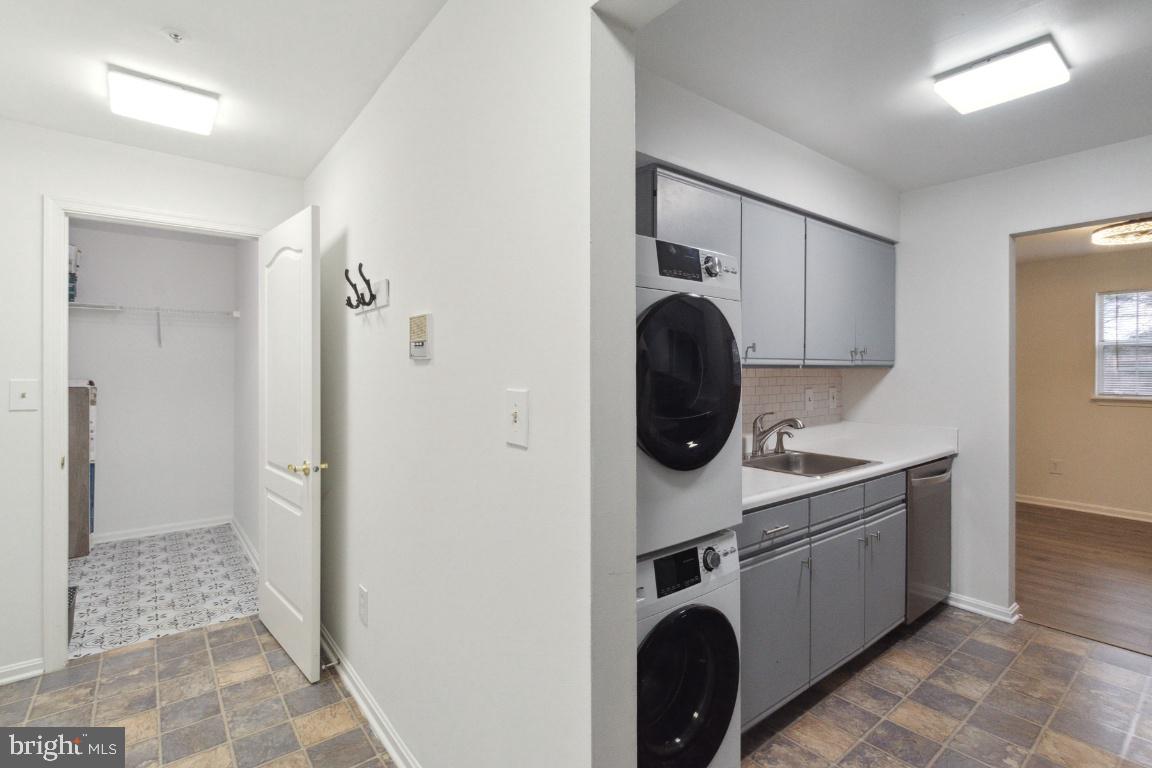8573 Falls Run Road, Unit E Ellicott City, MD 21043 - Photo 8 of 21 a utility room with dryer and washer
